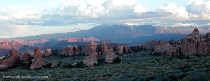 Hoodoos and Snow Peaked Mountains- Arches